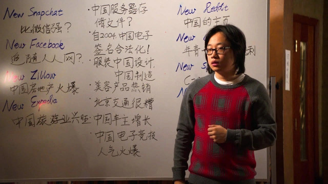 Jian Yang from the HBO show Silicon Valley standing in front of a whiteboard