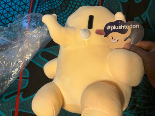 My Mastodon Plushie out of the bag. It also has a cute tag attached that says #Plushtodon