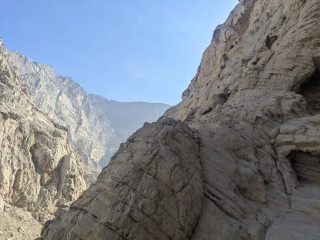 A look from the middle of the climb, a lot of rocks around, some of them are covered with sun.