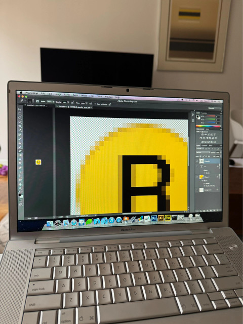 editing a small, pixelated icon of the subway “R” bullet