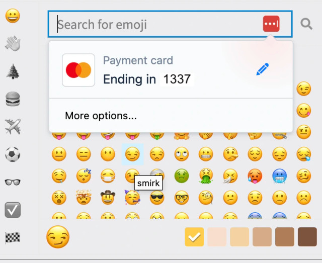 A "search for emoji" pop-up with lots of emoji to choose from. The cursor is placed in "Search for emoji" textbook, and it has one more pop-up from a password manager pluging offering to type in your bank card number in the field